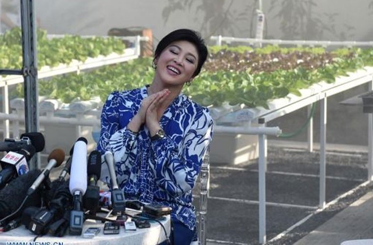 Nữ  cựu Thủ tướng Thái Lan Yingluck Shinawatra trông tươi tắn và rạng rỡ trong buổi họp báo tại nông trang của bà ở vùng ngoại ô đông bắc Thái Lan hôm 12/2.